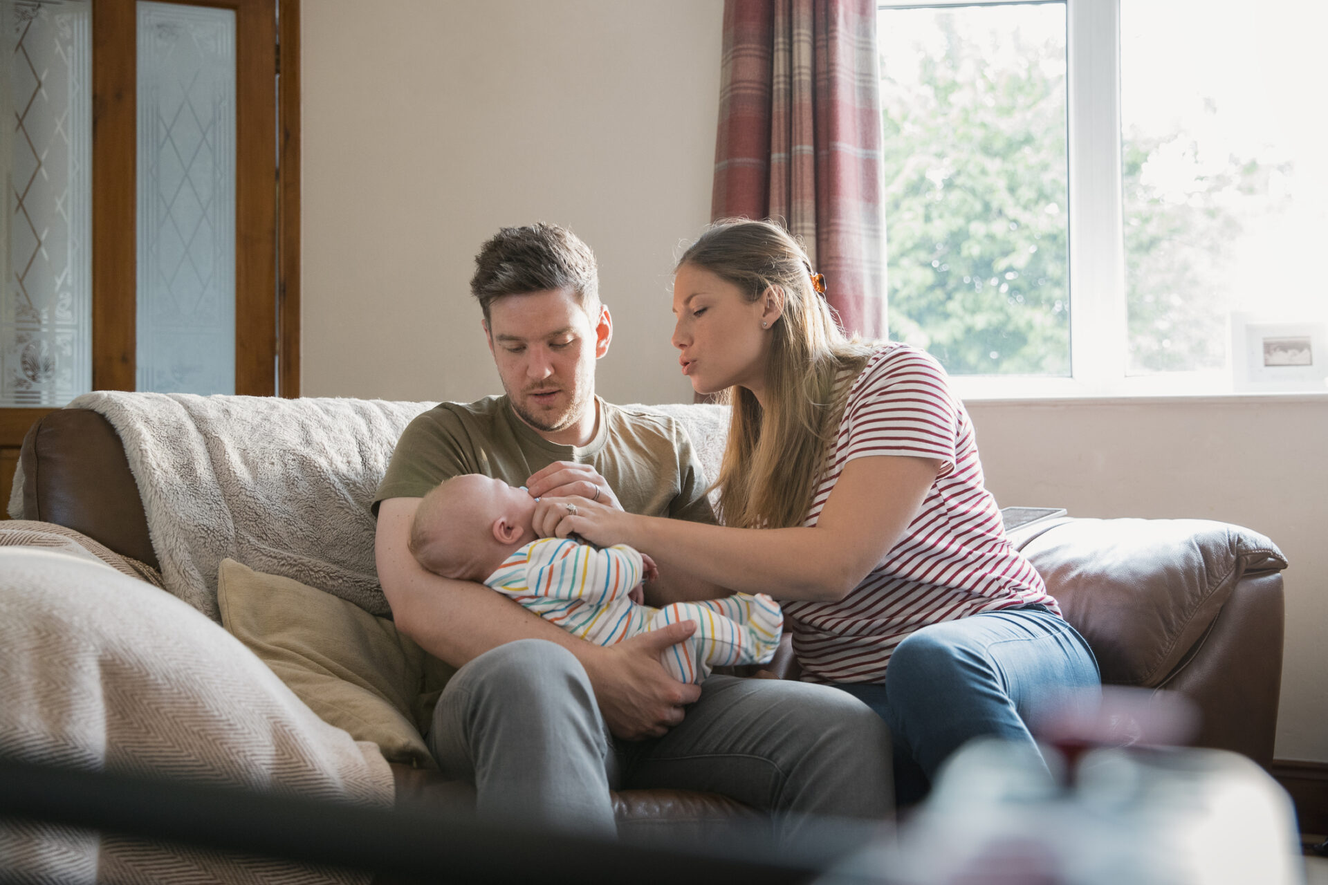Looking After Their Newborn Son