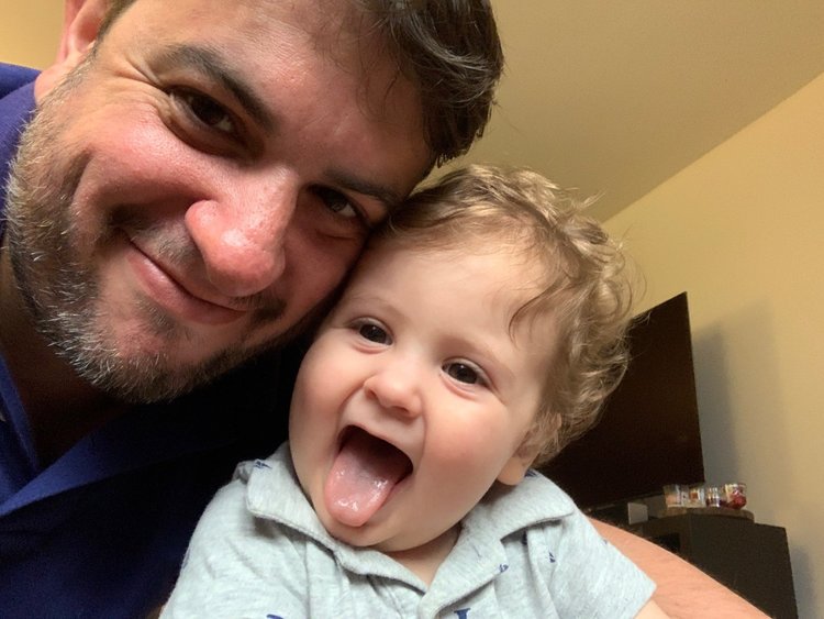 selfie of man with his child