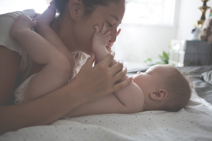 Mom playing with baby